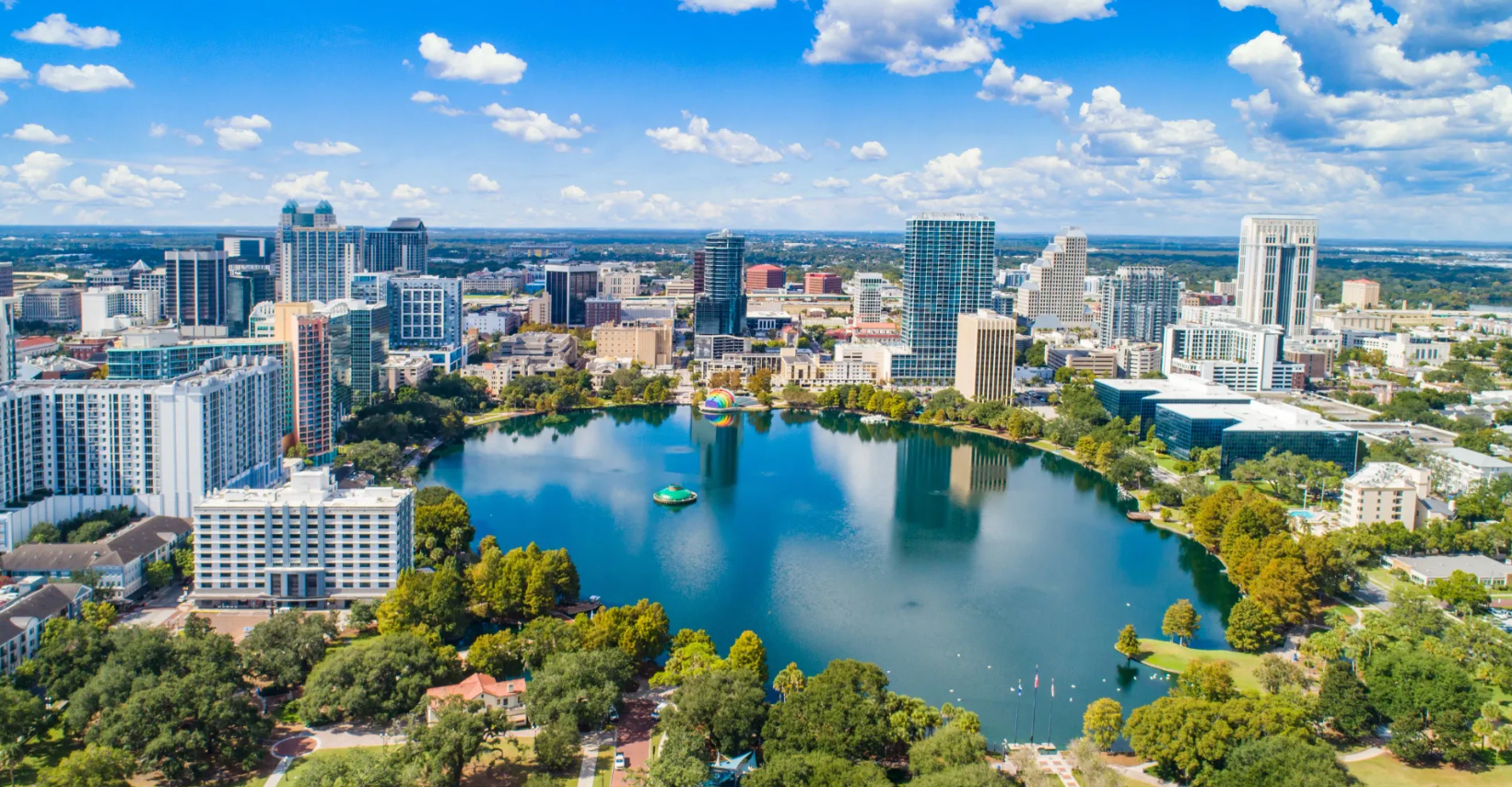 Aerial view of Lake Eola and the downtown Orlando, FL skyline