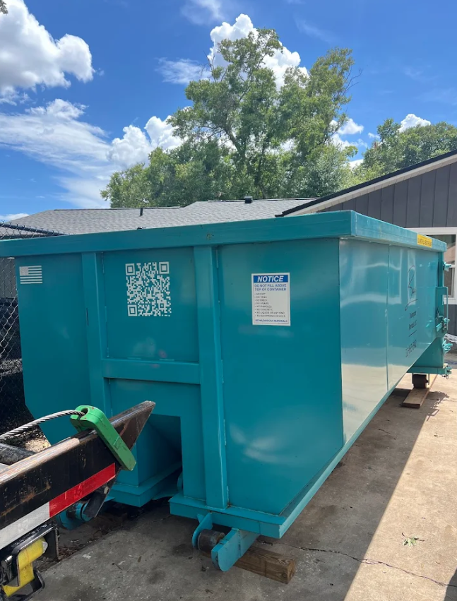 Teal Baus 20 yard roll-off dumpster in Orlando, FL