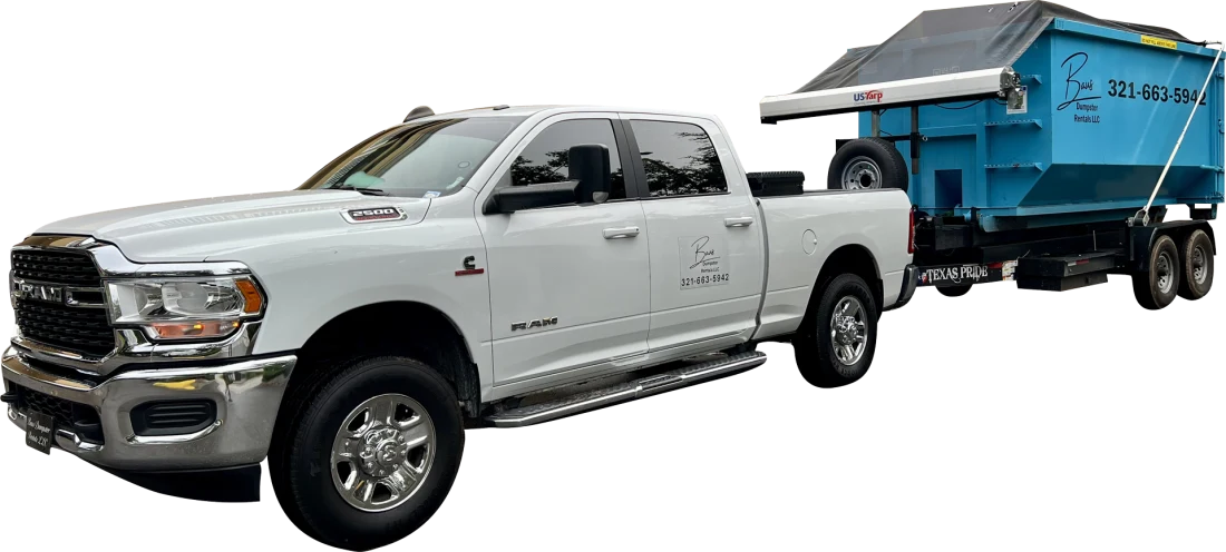 Baus Dumpster Rentals pickup truck towing a blue roll-off dumpster on its trailer