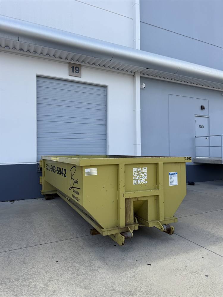 Roll-off dumpster rental at a commercial site in Orlando FL